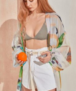 Model wearing The KNLs Hitch Jeans Shorts Off White with belt – summer denim style