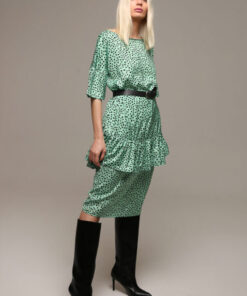 Side view of Angry Sally Oversized Green Mini Dress styled with boots