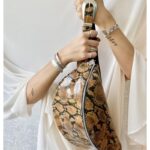 Animal print leather fanny bag with snake pattern by LaVita Handbags