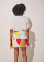Back view of Savor Wrap Mini Skirt Hug Print by THE KNls