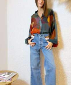 Front styling of Eros Printed Tunic Top Girls Talk by The KNLs with jeans